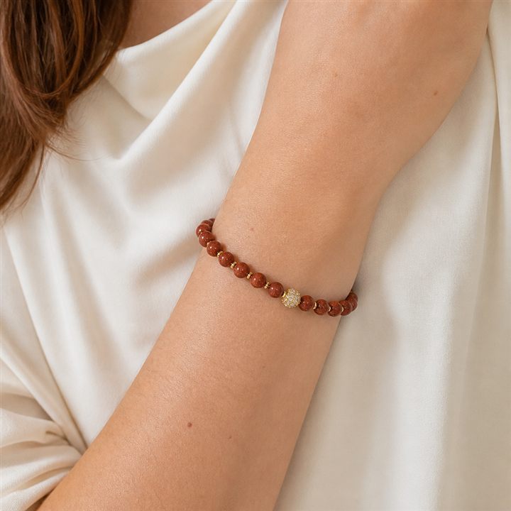 Bracciale a molla: pietre dure in tonalità rosso corallo