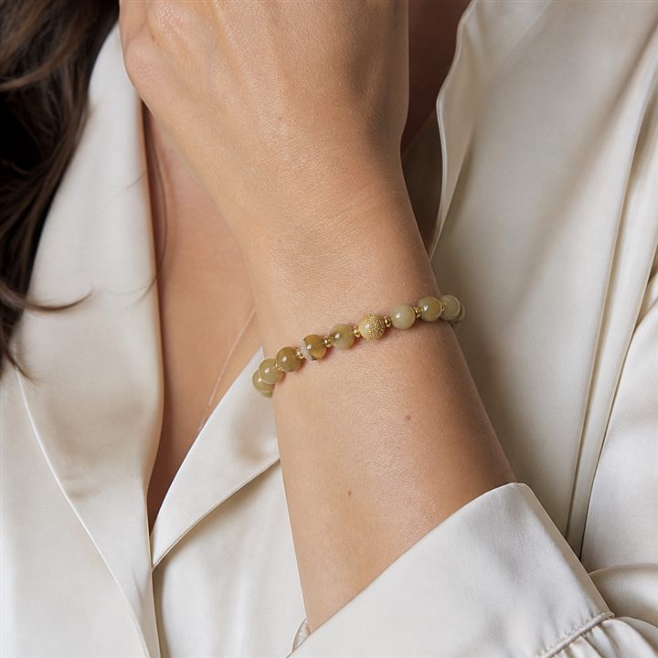 Bracciale a molla: pietre dure color ocra e giallo